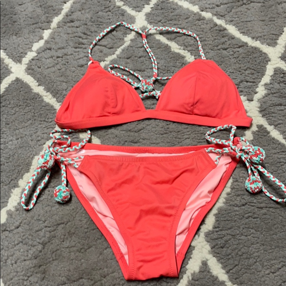 Victoria’s Secret coral bikini with pom pom ties